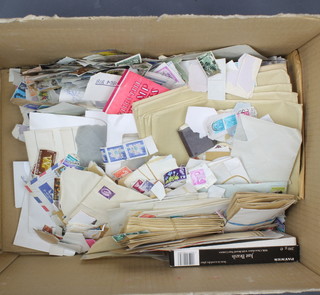A quantity of loose World stamps and stamped envelopes