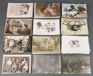 A collection of black and white First World War and later postcards including military scenes, Hendon, etc 