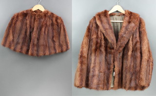 A lady's quarter length fur coat together with a lady's mink cape 
