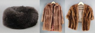 A brown mink stole, a lady's fur coat together with a fur hat 