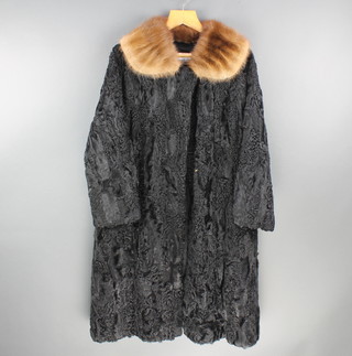 A lady's Persian lamb jacket with mink collar, labelled Shaddocks 