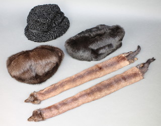 A black Belgian lamb hat, a mink hat, a black fur hat and 2 mink stoles 