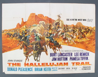 A UK Quad film poster "The Hallelujah Trail" starring Burt Lancaster, Lee Remick, Jim Hutton and Pamela Tiffin 30" x 40" together with a film poster "The Professionals" Panavision Technicolour starring Burt Lancaster, Lee Marvin, Robert Ryan, Jack Palance, Ralph Bellamy and Claudia Cardinale 30" x 20" 