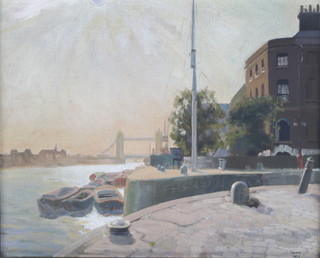 J E Moore 1929, oil on board, Thames side view with Tower Bridge in the background 12" x 15 1/2" 