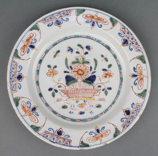 An 18th Century English Delft polychrome plate decorated with a basket of flowers 10 1/2" 