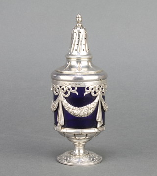 A Continental silver sugar shaker with swags and festoons having a blue glass liner 5 3/4" 