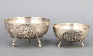 A Continental repousse silver bowl on hoof feet, a smaller do. 234 grams 