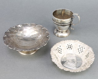 A stylish silver mug Sheffield 1991, a repousse dish and a pedestal bowl 223 grams 