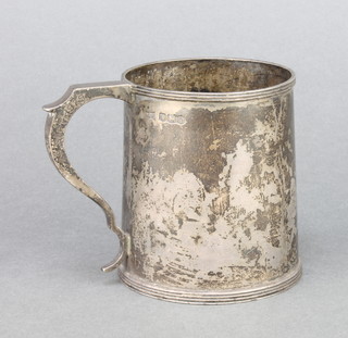 A silver mug with S scroll handle, Sheffield 1928 194 grams 