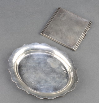 An Art Deco engine turned silver cigarette case Birmingham 1935 and a silver dish 250 grams 
