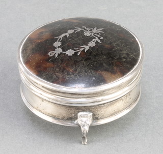 A silver and tortoiseshell picquet circular trinket box on scroll feet Birmingham 1918 