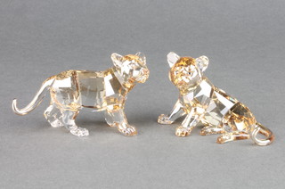 Two Swarovski Crystal coloured  lion cubs 3"  boxed