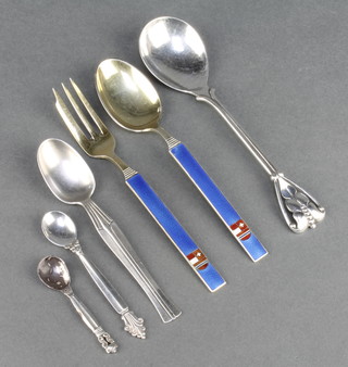 A pair of Norwegian sterling silver gilt and enamelled spoon and fork by T H. Marthinsen together with 4 other sterling spoons
