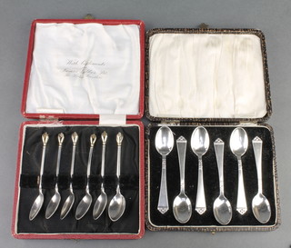 A set of 6 stylish sterling silver teaspoons by W & Sorensen together with a set of 6 stylish Continental teaspoons