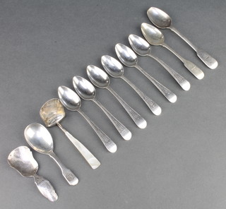 A set of 6 silver George IV teaspoons with bright cut decoration, 2 other teaspoons, 2 caddy spoons and a shovel