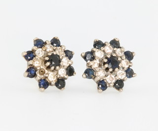 A pair of 18ct yellow gold sapphire and diamond ear studs 