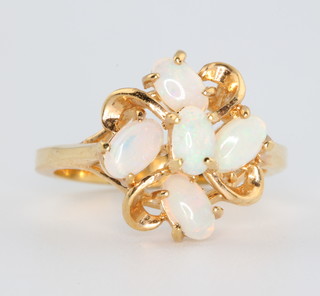 A yellow gold opal free form ring, size j 1/2