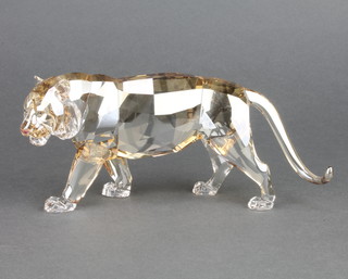 A Swarovski Crystal figure of a walking tiger 8" boxed