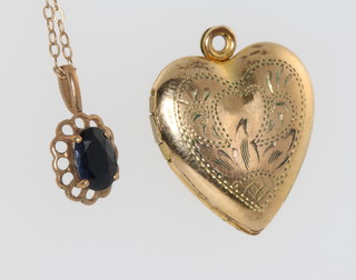 A 9ct yellow gold pendant and chain and a 10ct gold plated heart locket 