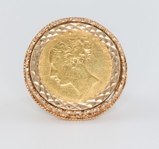 A Victorian half sovereign ring 1867 in a 9ct 4.2 gram mount size L 