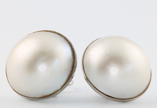 A pair of 1970's 18ct white gold pearl ear clips, 21mm diam. 