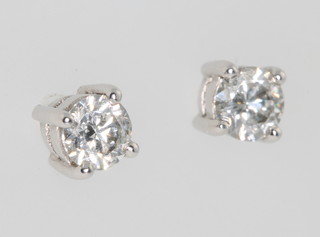 A pair of 18ct white gold diamond ear studs approx 0.65ct