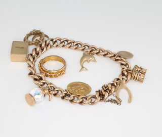 A 9ct yellow gold charm bracelet, gross weight 26 grams