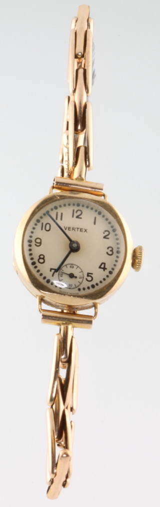 A ladys 9ct yellow gold Vertex wrist watch with seconds at 6 o'clock on a ditto bracelet