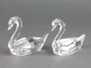 Two Swarovski Crystal figures of swans 4" boxed
