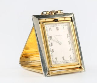 A good Art Deco 18ct yellow gold, white gold/platinum folding travelling timepiece, the rectangular dial inscribed Lacloche, the interior engraved with presentation inscription, the exterior with stylised Art Deco monogram 46mm x 33mm 