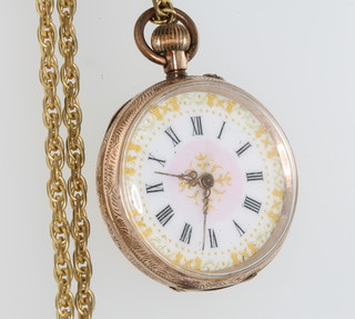 A 9ct yellow gold Edwardian fob watch with enamelled dial on a gilt chain 
