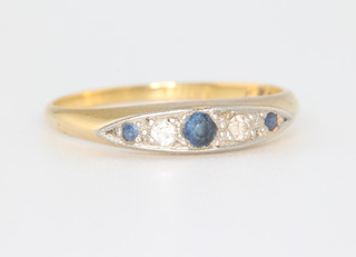 An 18ct yellow gold sapphire and diamond ring size N 