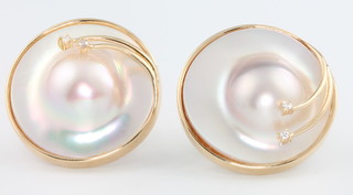 A pair of 14ct yellow gold circular pearl ear clips 