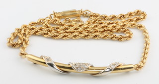 An 18ct yellow gold diamond set necklace, 18 grams