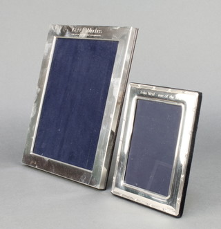 Two modern rectangular silver photograph frames 6 1/2" x 5" and 9 1/2" x 7 1/2" 