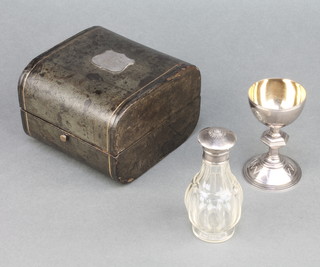 A Victorian silver chalice with hexagonal knop together with a silver mounted wine bottle contained in a fitted case 1890/91 Two cased sets