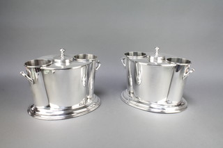 A pair of plated twin handled 2 bottle wine coolers  