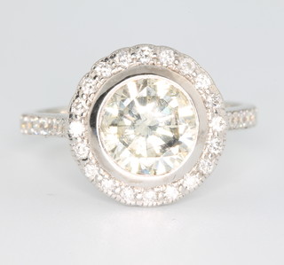 An 18ct white gold diamond ring, the centre stone approx 2.17ct surrounded by brilliant cut diamonds size N 
