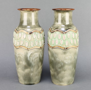 A pair of Royal Doulton green ground tapered vases with geometric decoration 12" 