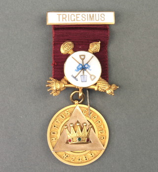 A 9ct yellow gold and enamel Masonic jewel with presentation inscription 