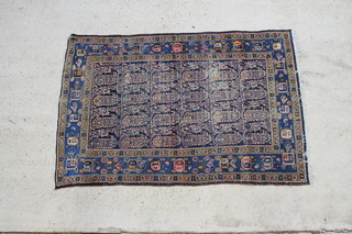 A Persian Malayer rug 73" x 48", in wear
