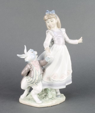 A Lladro figure of Alice with The White Rabbit 5740 9" 