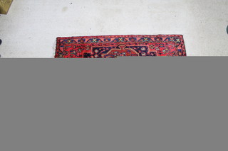 A blue and green ground Persian Brojerd rug with central medallion 85" x 53" 
