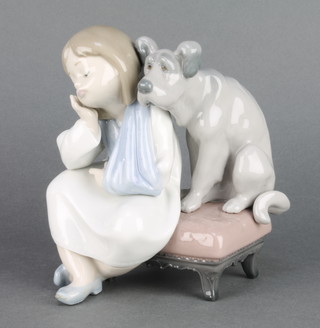 A Lladro group of a girl sitting on a stool with a hound 6" 