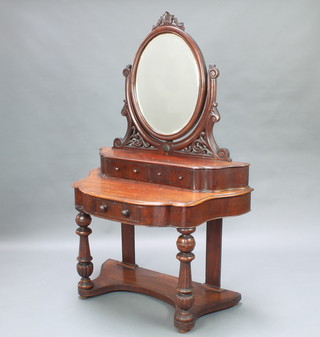 A Victorian mahogany Duchess dressing table with oval bevelled plate mirror, the base fitted 2 glove drawers and 1 short drawer with undertier, raised on turned supports 65"h x 42"w x 22"d 