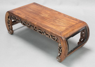 A rectangular Chinese Padouk opium table with pierced apron, raised on turned supports 30"h x 35"w x 17"d 