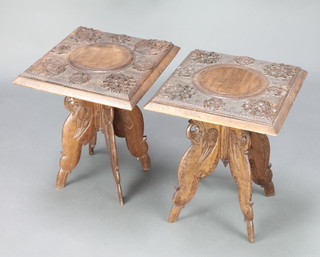 A pair of Indian square carved tables raised on folding stands 18"h x 15 1/2" x 16" 