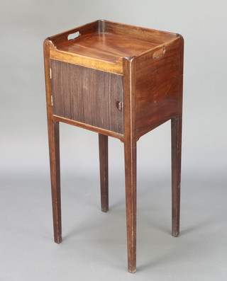 A George III mahogany tray top commode enclosed by a panelled door raised on square tapered supports 33"h x 15"w x 13"d 