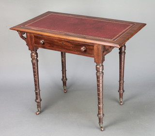 An Edwardian mahogany Art Nouveau writing table with inset writing surface and fret work decoration to the sides, fitted a frieze drawer and raised on turned supports 27"h x 35"w x 21"d 
  