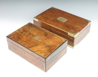 A Victorian rectangular light oak and brass banded trinket box with hinged lid 4 1/2"h x 15"w x 10"d and a VIctorian figured walnut writing slope with brass line inlay 5"h x 13 1/2"w x 9"d 